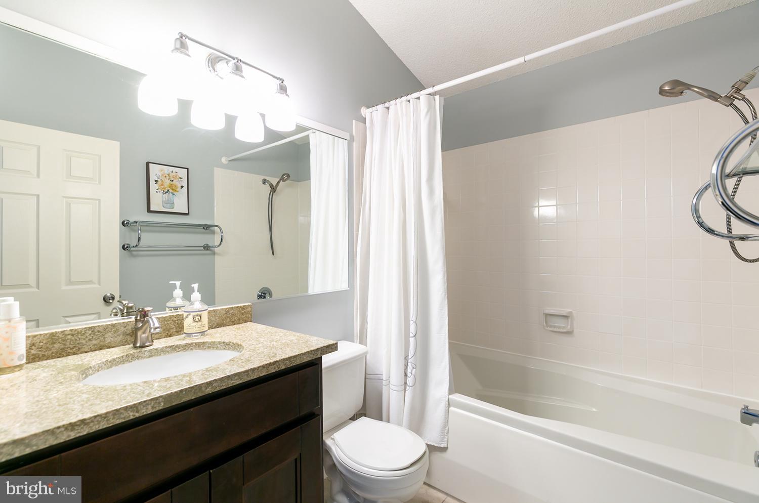 1413 Newport Spring Court Reston, VA 20194 - Photo 17 of 29 Ensuite bathroom remodeled in 2014.