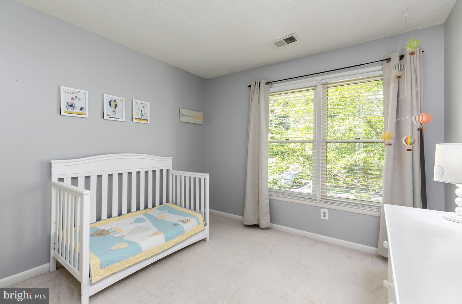 1413 Newport Spring Court Reston, VA 20194 - Photo 20 of 29 Plenty of light comes in this third bedroom.