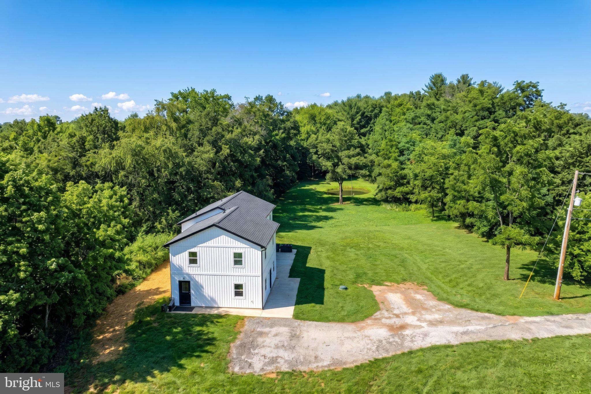 1001 Frederick Pike Littlestown, PA 17340 - Photo 41 of 53 Charming home nestled in lush greenery.