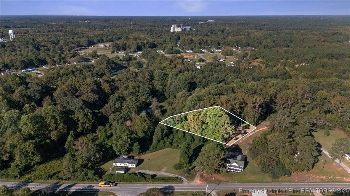 0 Fire Dept Road Clayton, NC 27527 - Photo 11 of 34 an aerial view of a residential house with a yard