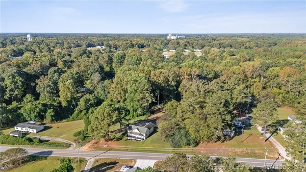 an aerial view of residential house with outdoor space