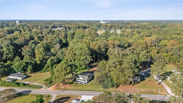 an aerial view of residential house with outdoor space