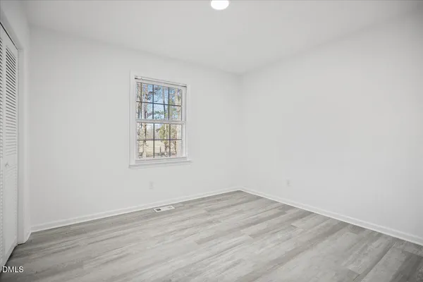an empty room with a window