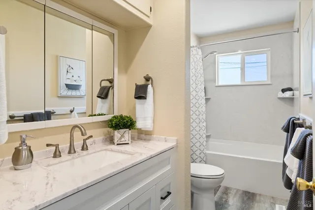 a bathroom with a shower and a tub