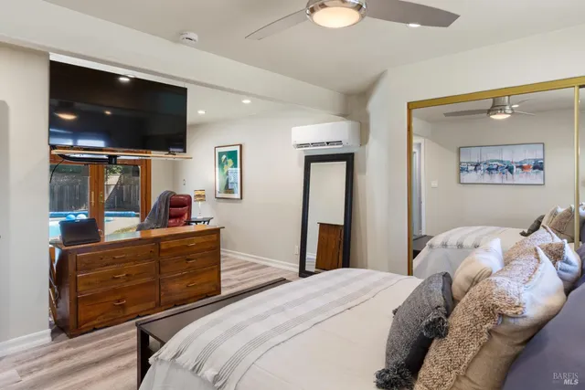 a bathroom with a sink and vanity