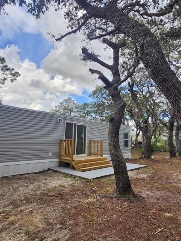 5641 South Butan Point Homosassa, FL 34446 - Photo 12 of 14 a front view of a house with a yard