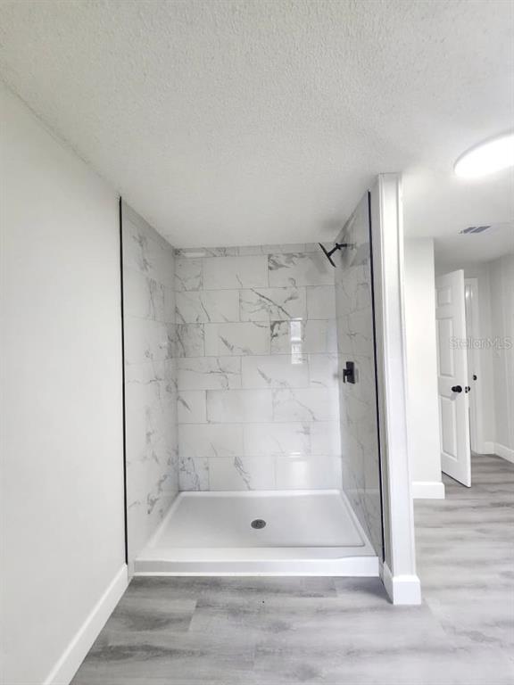 5641 South Butan Point Homosassa, FL 34446 - Photo 7 of 14 a bathroom with a shower