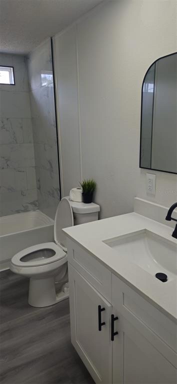 5641 South Butan Point Homosassa, FL 34446 - Photo 9 of 14 a bathroom with a sink a toilet and shower