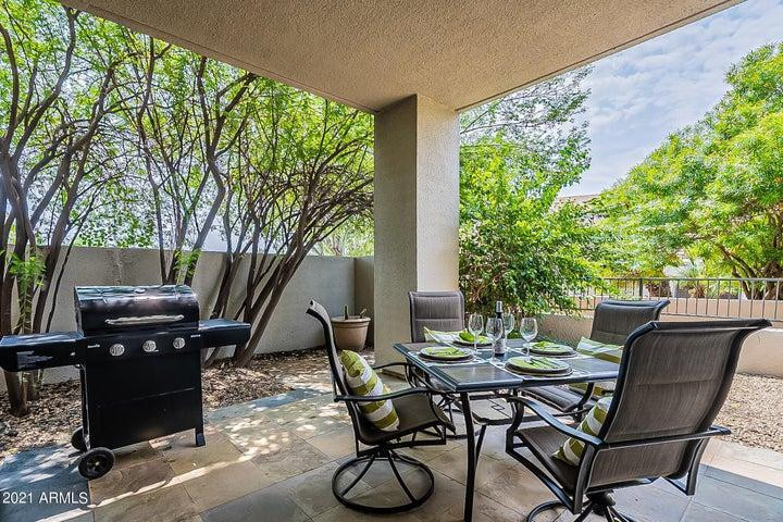 7700 East Gainey Ranch Road, Unit 153 Scottsdale, AZ 85258 - Photo 24 of 24 a view of an outdoor seating area