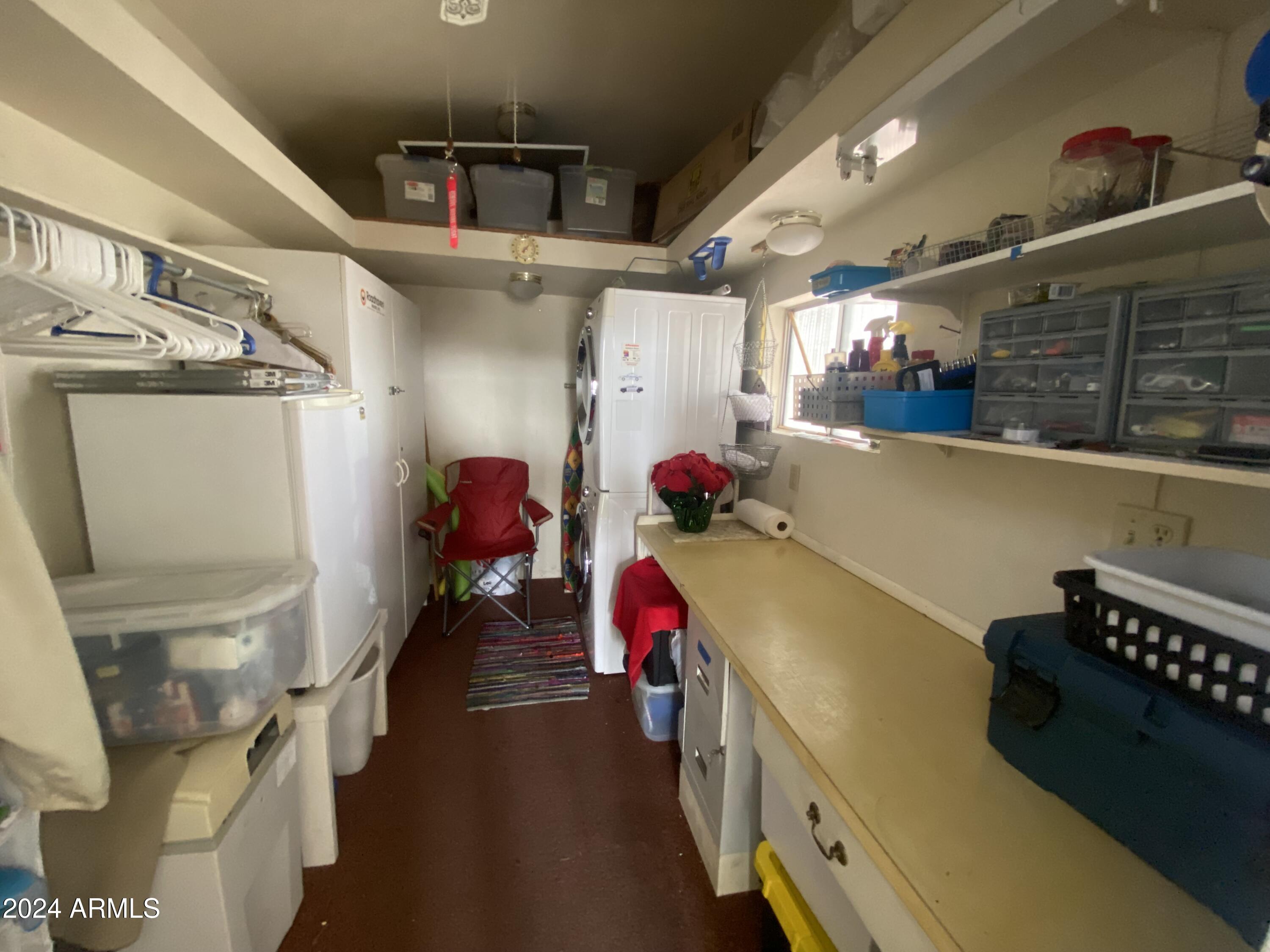 1415 South Havasupai Drive, Unit 415 Apache Junction, AZ 85119 - Photo 27 of 28 a view of storage and utility room