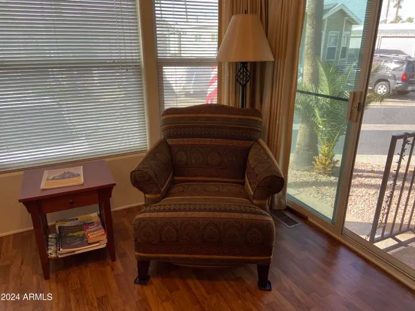 a living room with furniture and a window