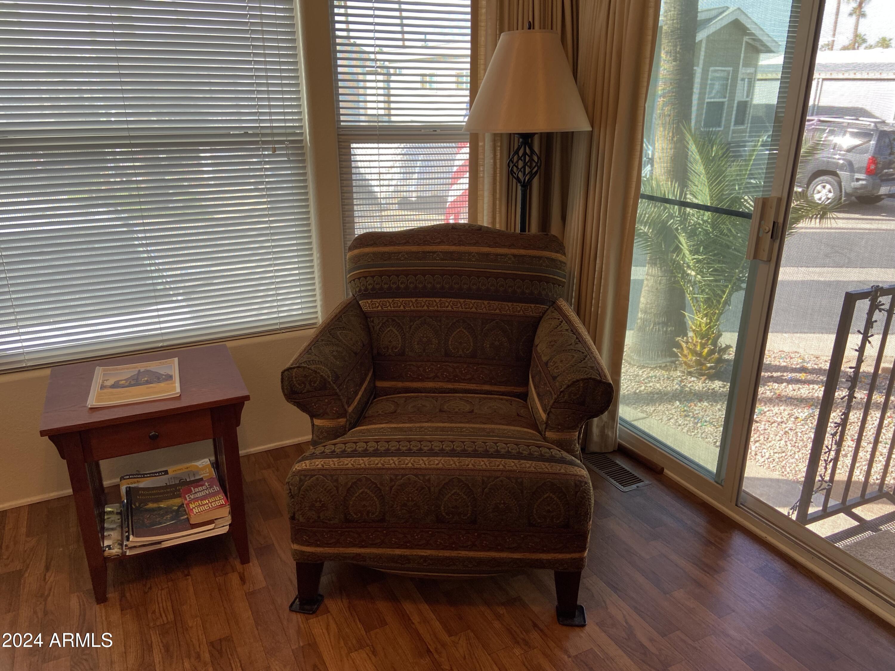 1415 South Havasupai Drive, Unit 415 Apache Junction, AZ 85119 - Photo 5 of 28 a living room with furniture and a window