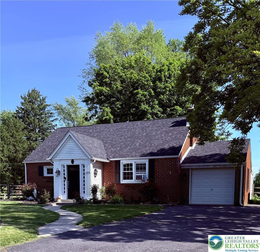1275 Macada Road Bethlehem, PA 18017 - Photo 7 of 87 front view of a house with a yard
