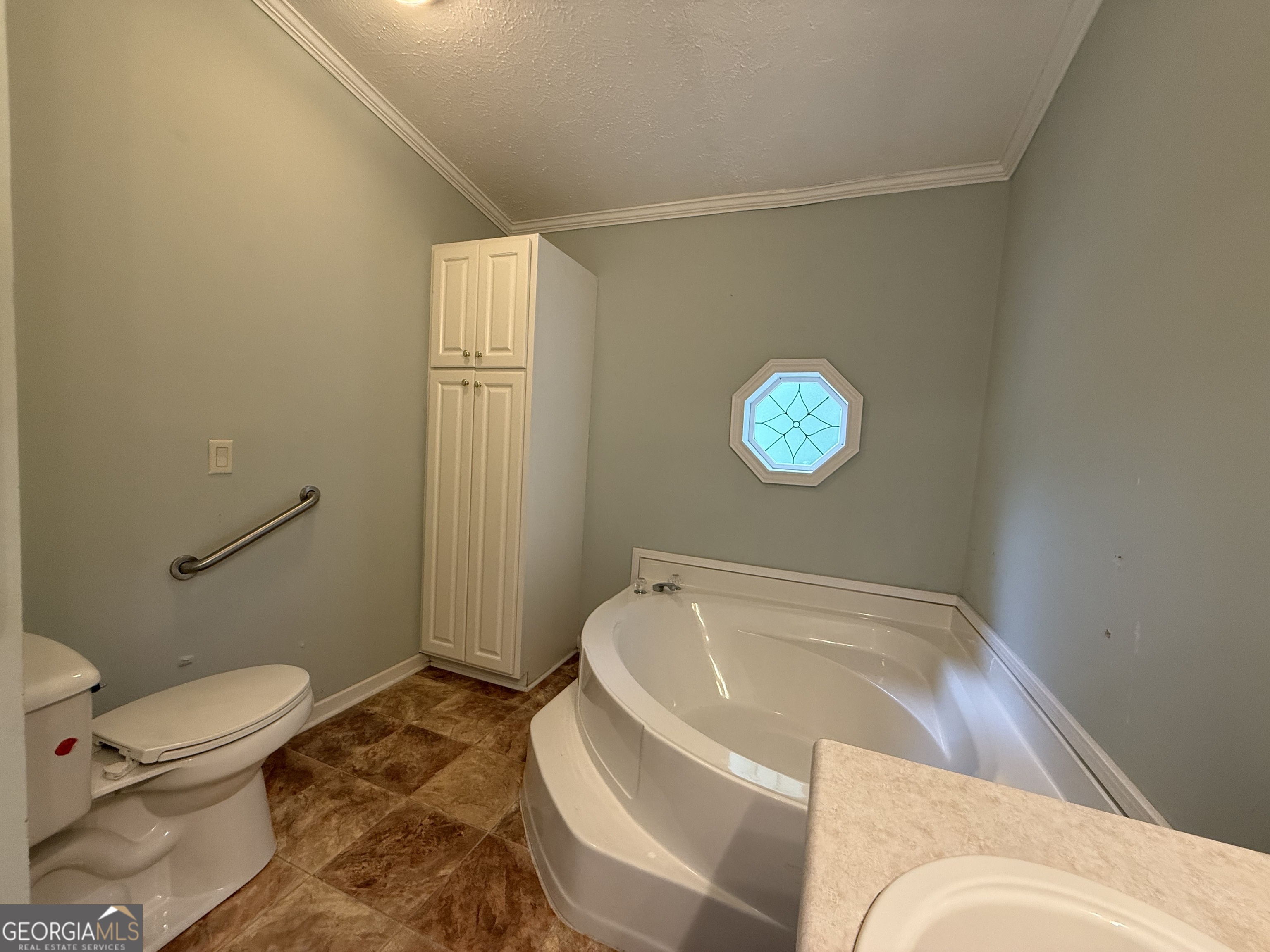 1081 Marshall Church Road Thomson, GA 30824 - Photo 19 of 26 a bathroom with a sink and a toilet