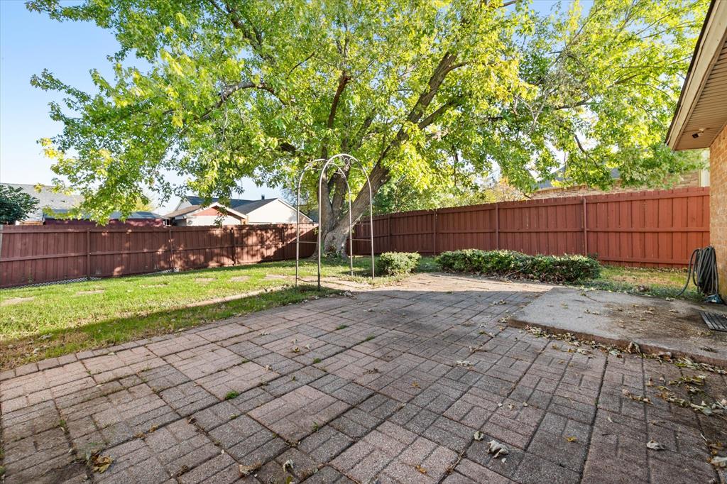 7308 Red Osier Road Dallas, TX 75249 - Photo 24 of 27 a view of a backyard
