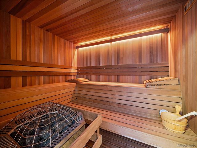 a kitchen with stainless steel appliances granite countertop sink stove and granite counter top