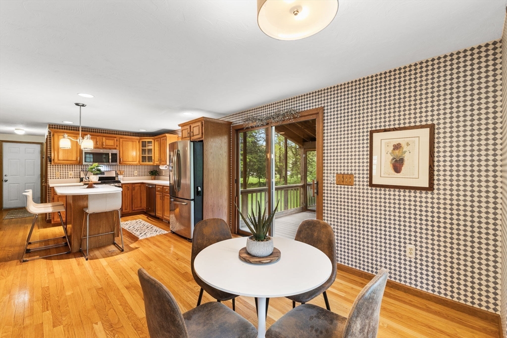 2 McTee Drive Norton, MA 02766 - Photo 11 of 42 a view of a dining room with furniture window and outside view