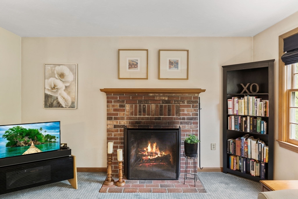 2 McTee Drive Norton, MA 02766 - Photo 15 of 42 a living room with furniture and a fireplace