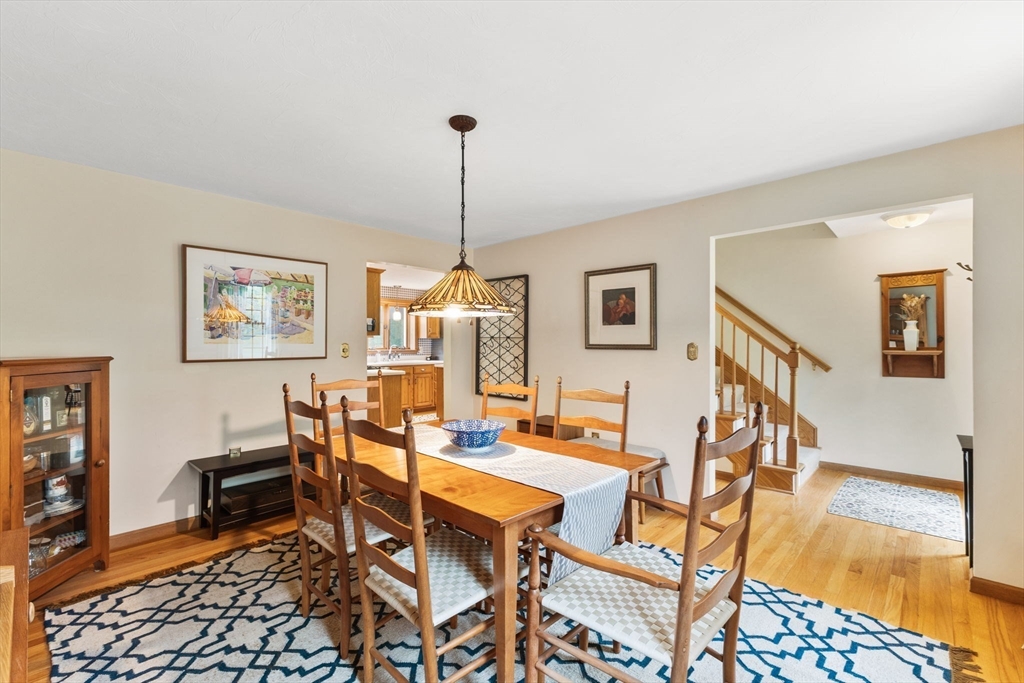 2 McTee Drive Norton, MA 02766 - Photo 19 of 42 a dining room with furniture and wooden floor