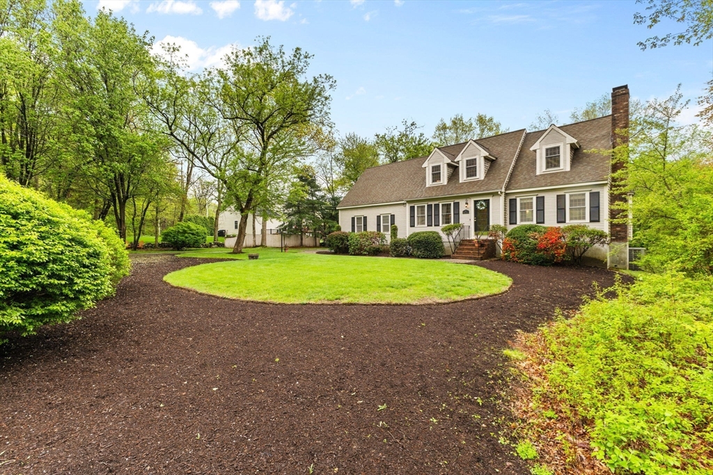 2 McTee Drive Norton, MA 02766 - Photo 2 of 42 a view of a house with a garden