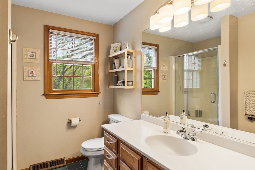 2 McTee Drive Norton, MA 02766 - Photo 25 of 42 a bathroom with a sink toilet and a mirror