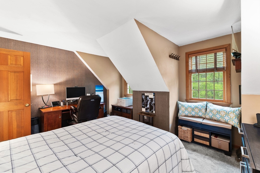 2 McTee Drive Norton, MA 02766 - Photo 30 of 42 a bed room with a bed and a chair