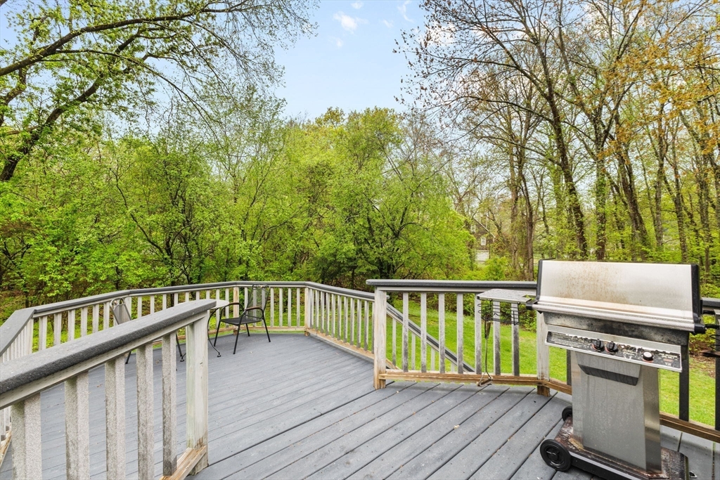 2 McTee Drive Norton, MA 02766 - Photo 38 of 42 a view of a roof deck with wooden floor and fence