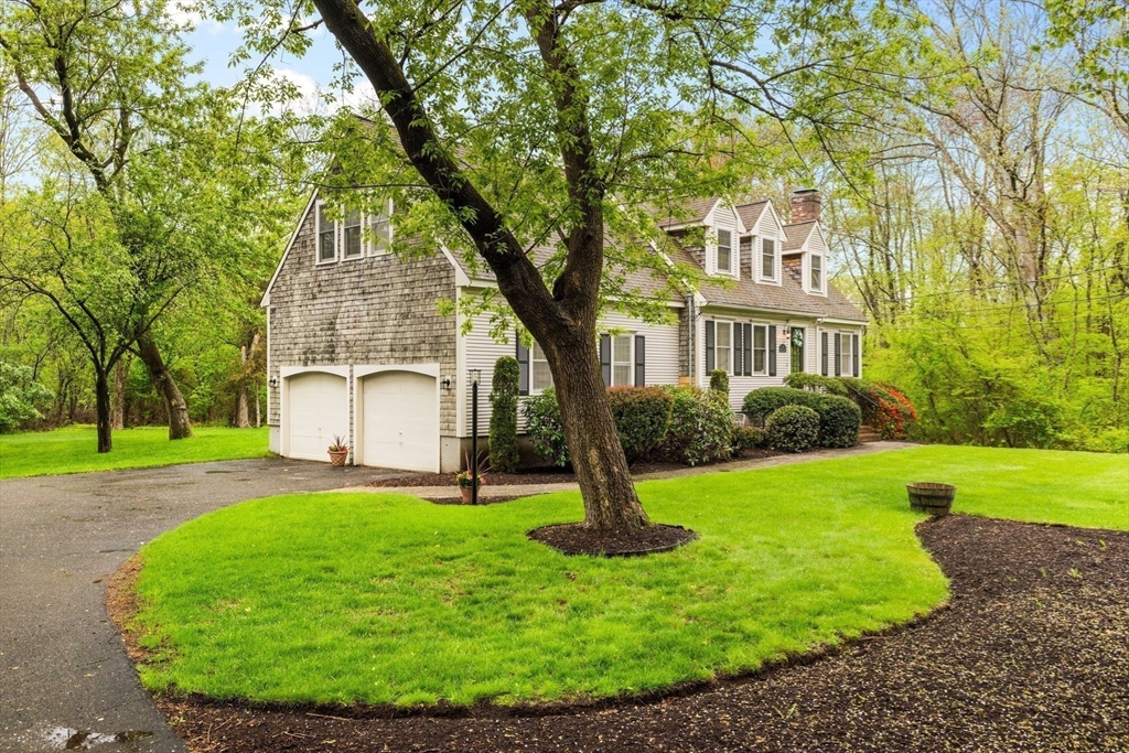 2 McTee Drive Norton, MA 02766 - Photo 40 of 42 a front view of a house with garden
