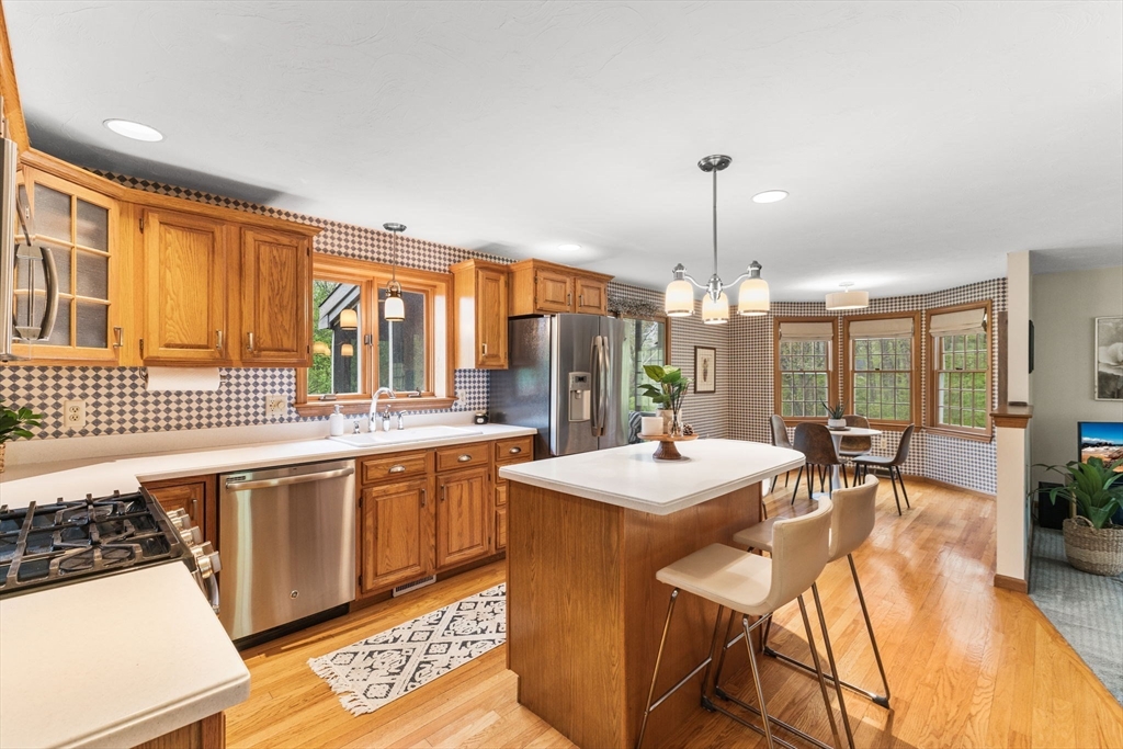 2 McTee Drive Norton, MA 02766 - Photo 6 of 42 a large kitchen with a table and chairs