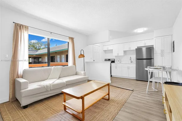 a living room with furniture and a table