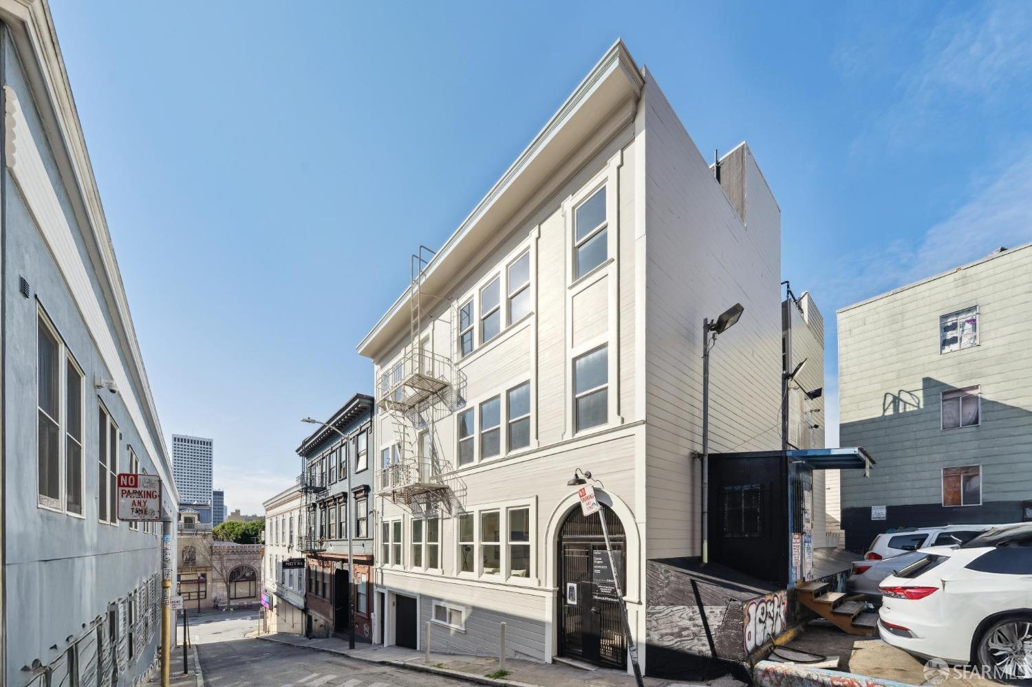 31 Romolo Place, Unit 4 San Francisco, CA 94133 - Photo 14 of 23 a view of buildings from a balcony
