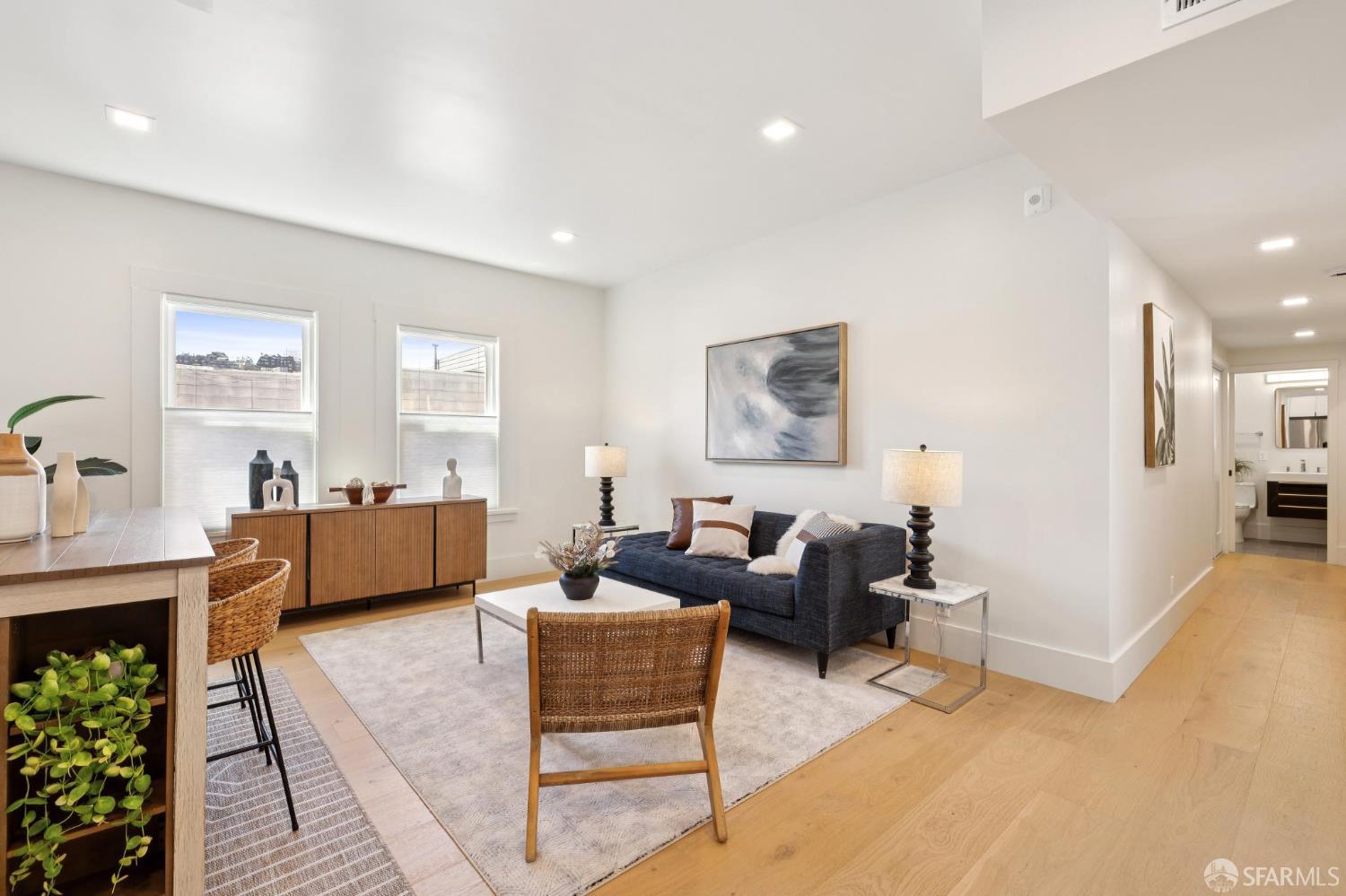 31 Romolo Place, Unit 4 San Francisco, CA 94133 - Photo 2 of 23 a living room with furniture and a couch