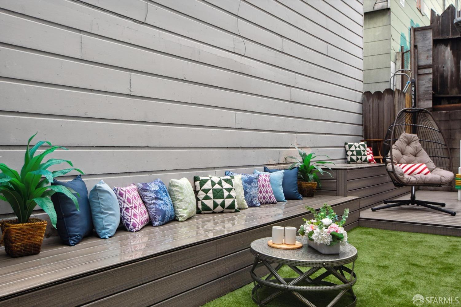 31 Romolo Place, Unit 4 San Francisco, CA 94133 - Photo 22 of 23 a view of a chairs and table in a patio