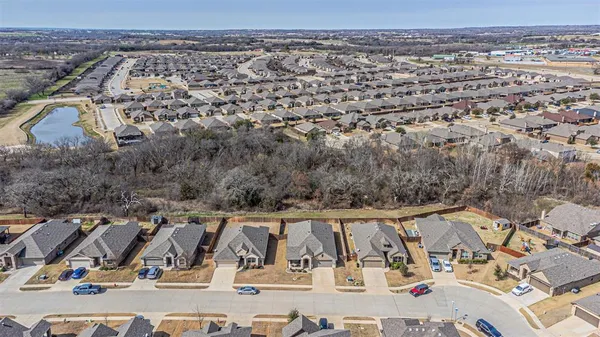 an aerial view of a house with a outdoor space