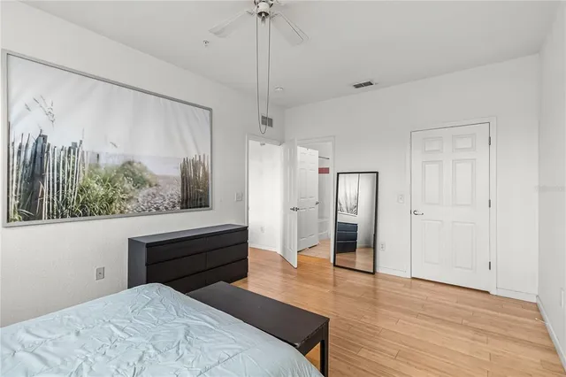 a room with a bed and a window