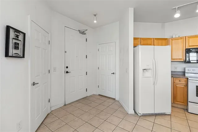 a view of a bathroom with a shower and a sink