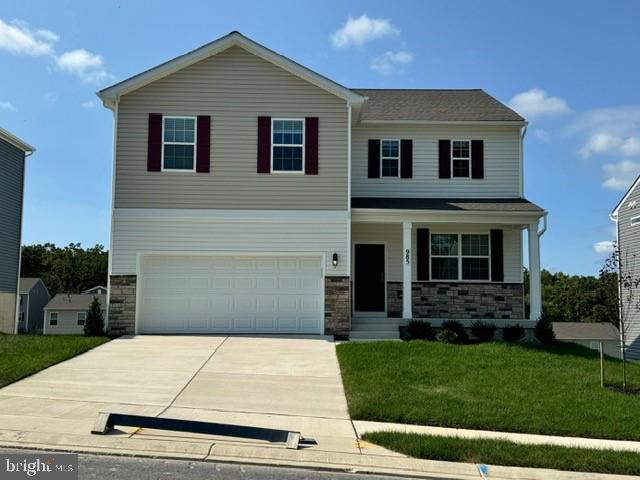 985 Pagonia Road Joppa, MD 21085 - Photo 2 of 35 a front view of a house with a yard