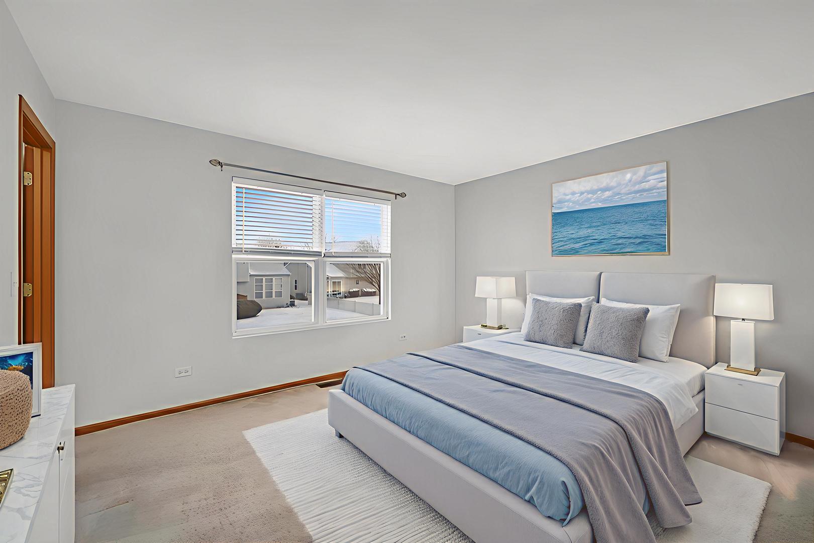 1640 Clover Court Romeoville, IL 60446 - Photo 17 of 30 a spacious bedroom with a bed and a window