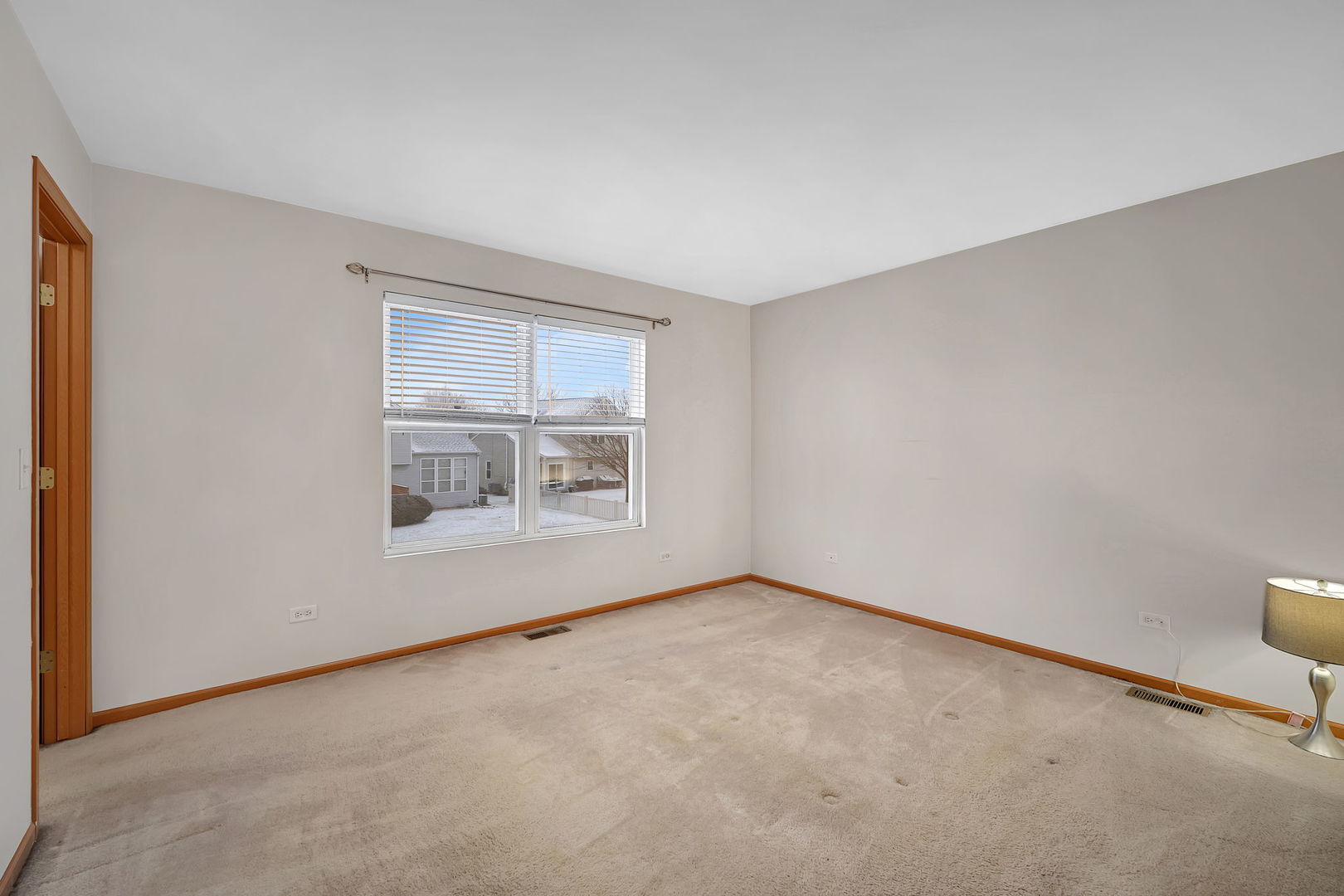 1640 Clover Court Romeoville, IL 60446 - Photo 18 of 30 a view of an empty room with a window