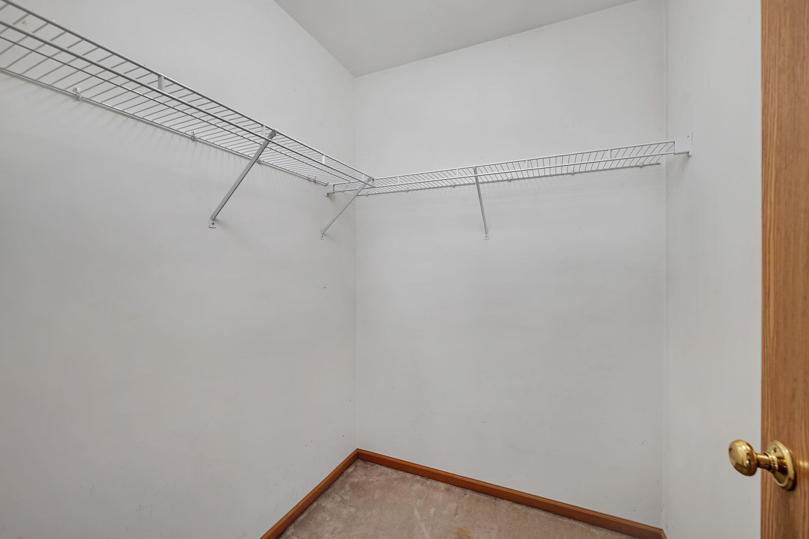 1640 Clover Court Romeoville, IL 60446 - Photo 19 of 30 a view of a room with racks on the wall