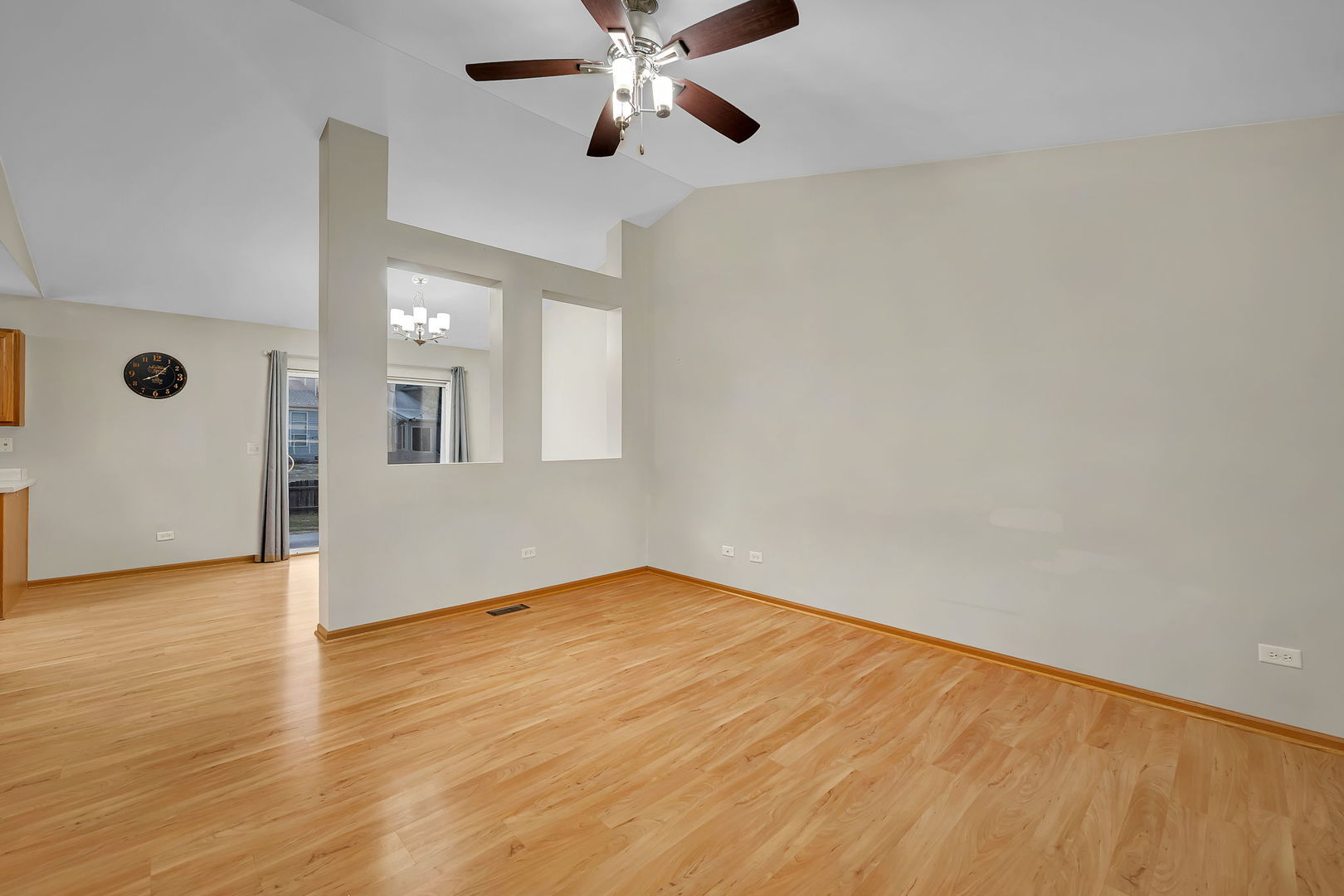 1640 Clover Court Romeoville, IL 60446 - Photo 7 of 30 wooden floor in an empty room with a window