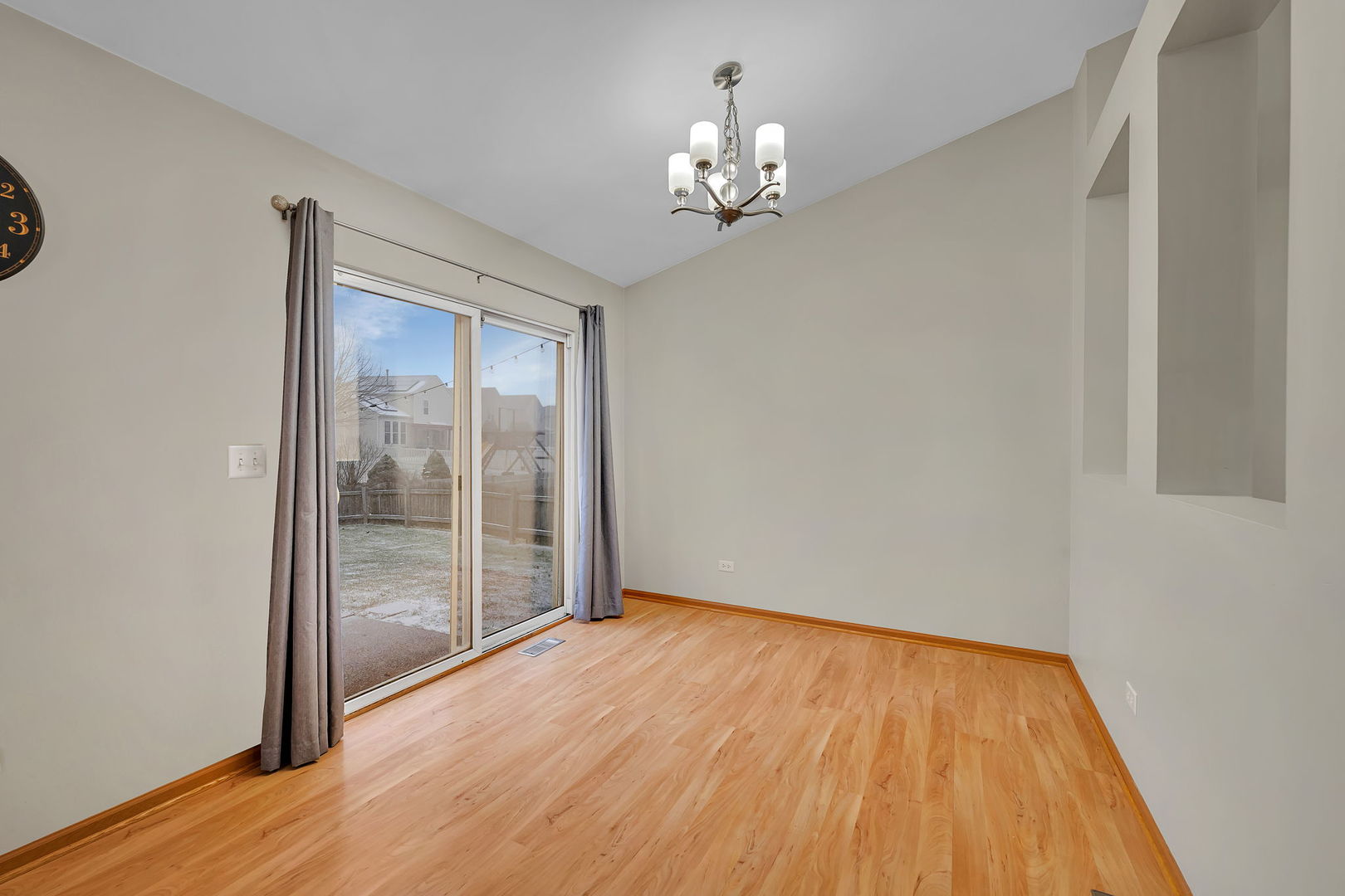 1640 Clover Court Romeoville, IL 60446 - Photo 9 of 30 a view of empty room with wooden floor