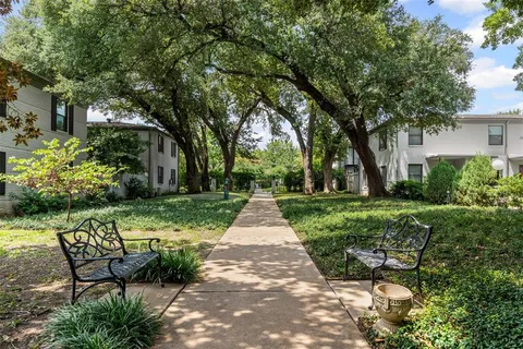 a view of patio in a backyard