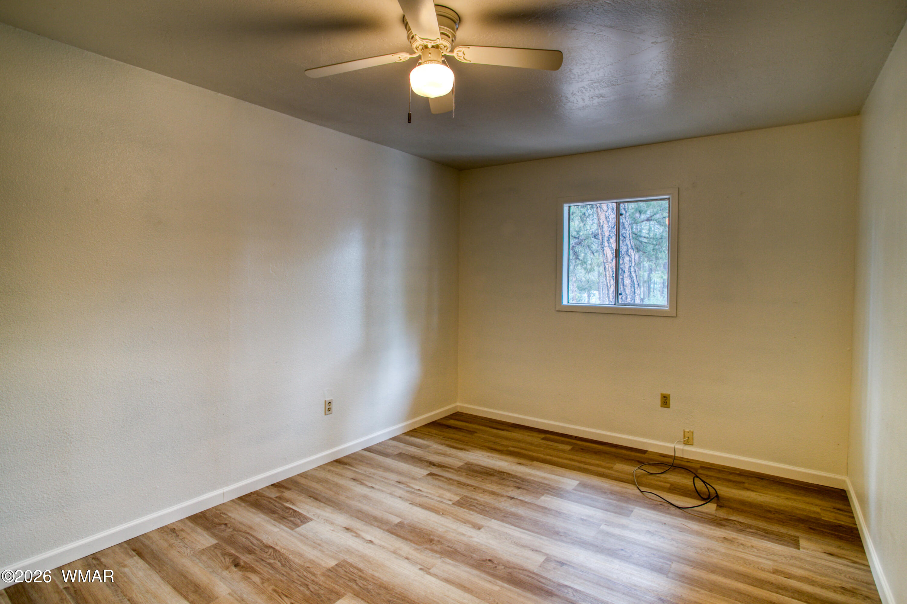 94 Southlake Road Lakeside, AZ 85929 - Photo 2 of 16 wooden floor in an empty room