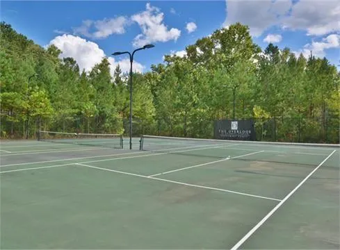 a view of living room with furniture and a window