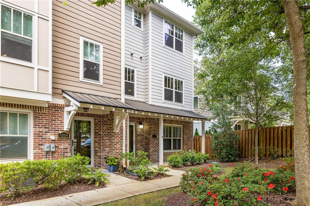 1333 Oakview Road Decatur, GA 30030 - Photo 24 of 28 a view of a house with a yard and garden