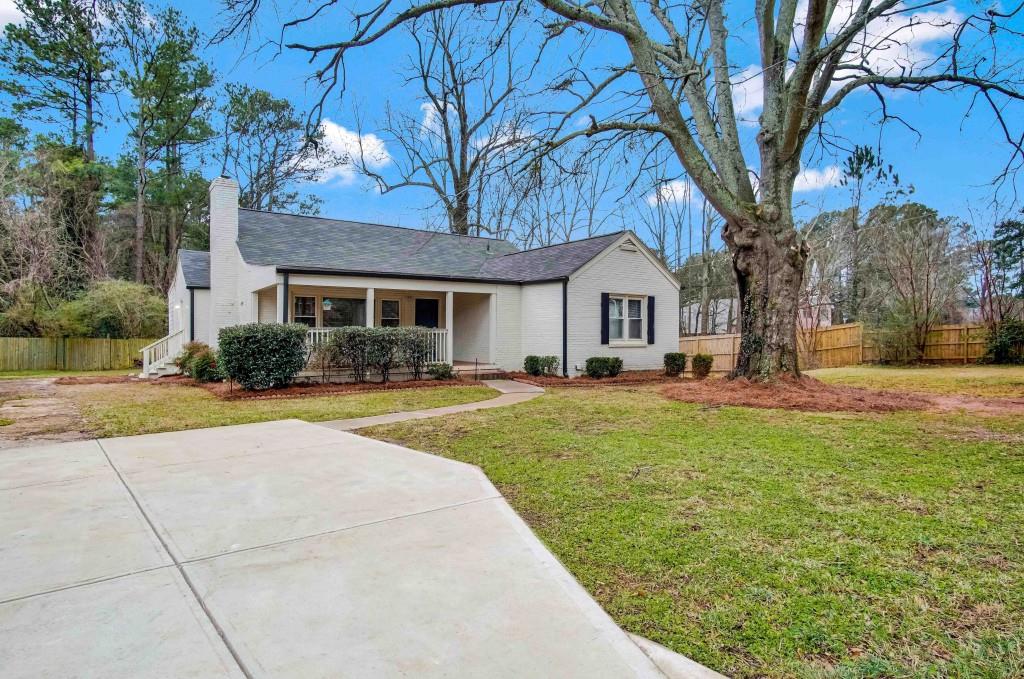 2715 Tilson Road Decatur, GA 30032 - Photo 1 of 1 a front view of a house with a yard