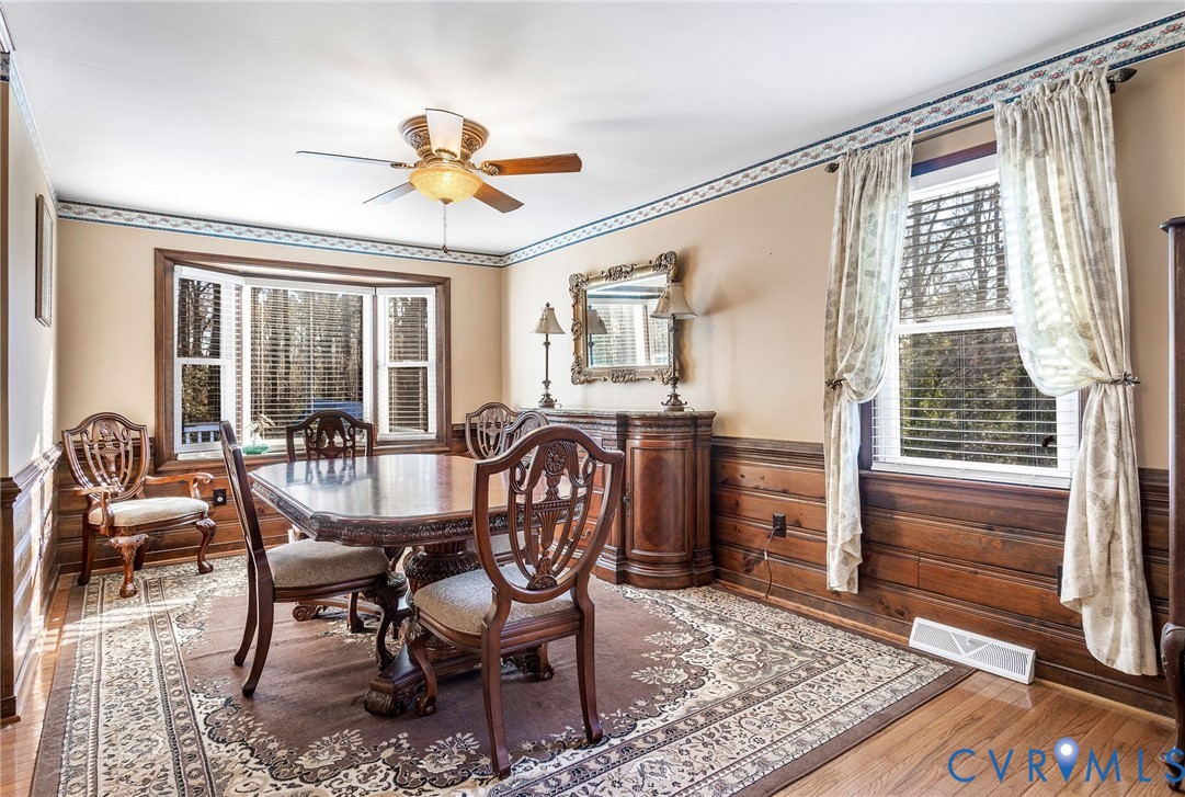 2901 Tipton Street Colonial Heights, VA 23834 - Photo 14 of 29 a view of a dining room with furniture window and wooden floor