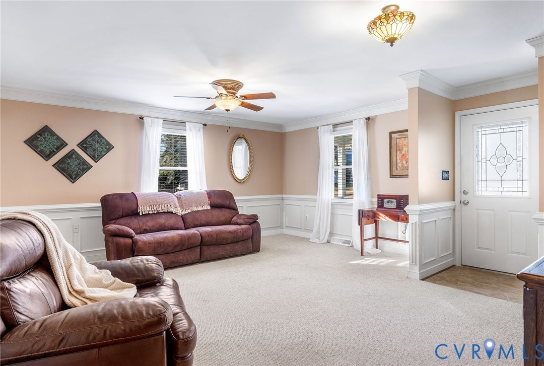 2901 Tipton Street Colonial Heights, VA 23834 - Photo 6 of 29 a living room with furniture and a chandelier