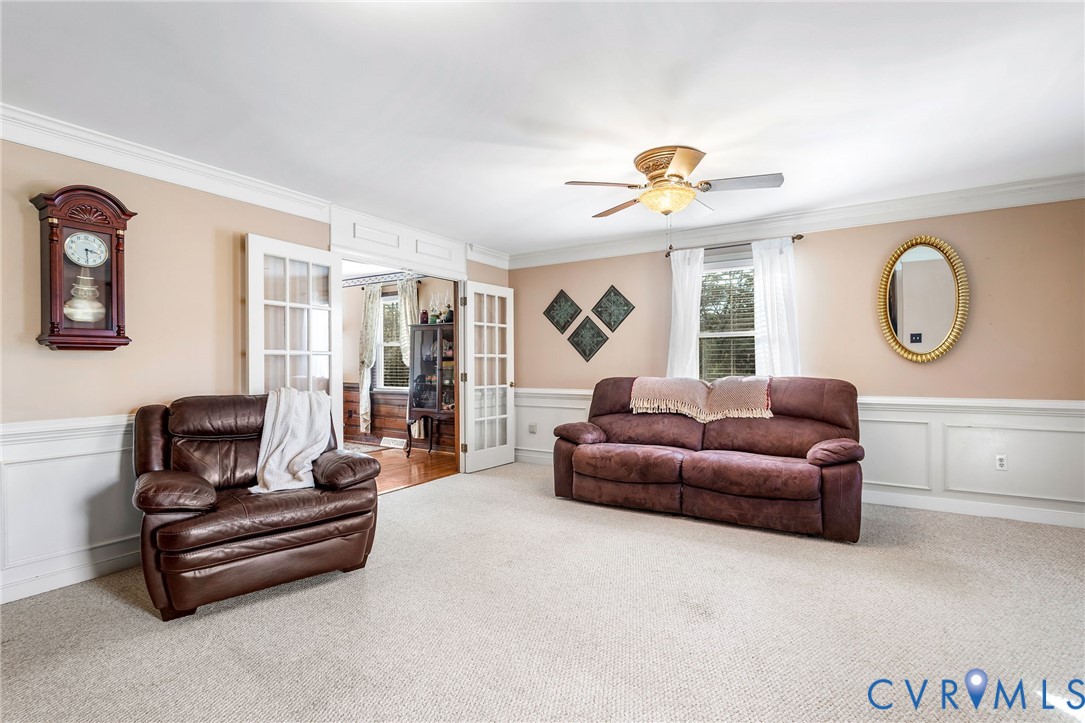 2901 Tipton Street Colonial Heights, VA 23834 - Photo 7 of 29 Living room with a decorative wall, wainscoting, f